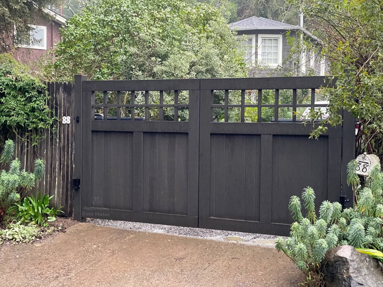Black wooden privacy gate with square lattice design at the top installed by Automatic Gate Mates in Bay Area