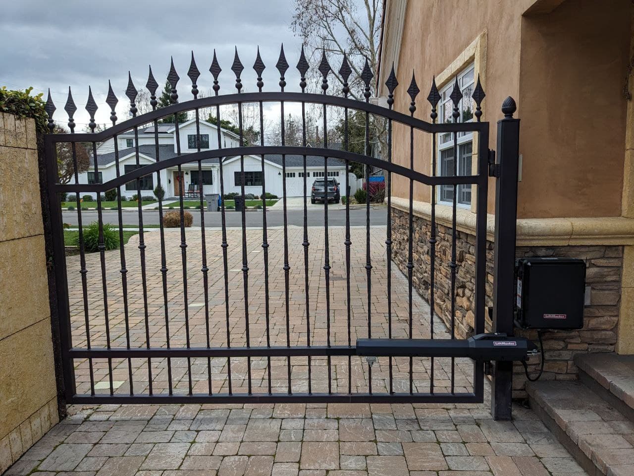 short-wrought-iron-gate-installation